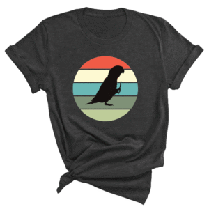 Shirt met silhouet van caique in retro zonsondergang design