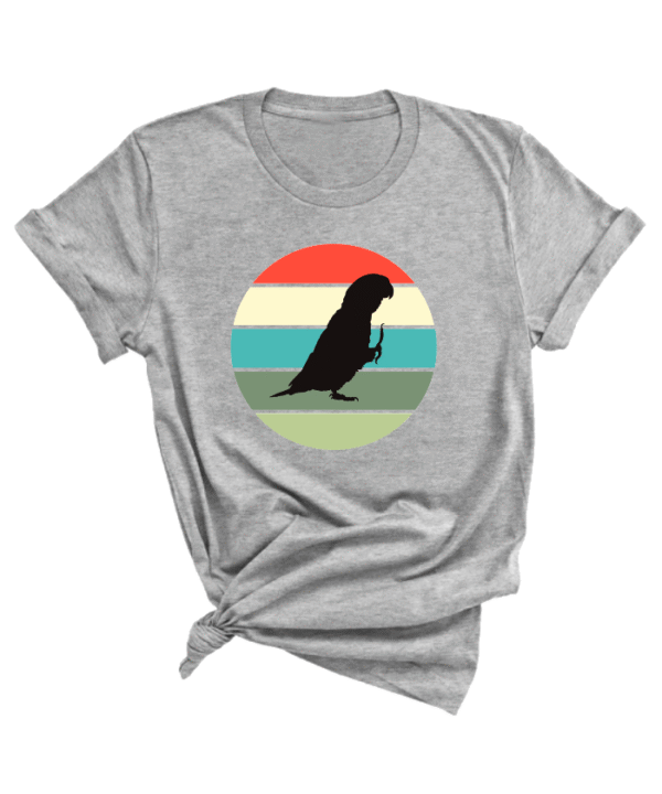 Shirt met silhouet van caique in retro zonsondergang design