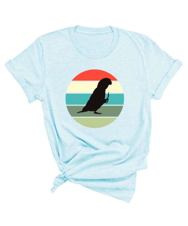 Shirt met silhouet van caique in retro zonsondergang design