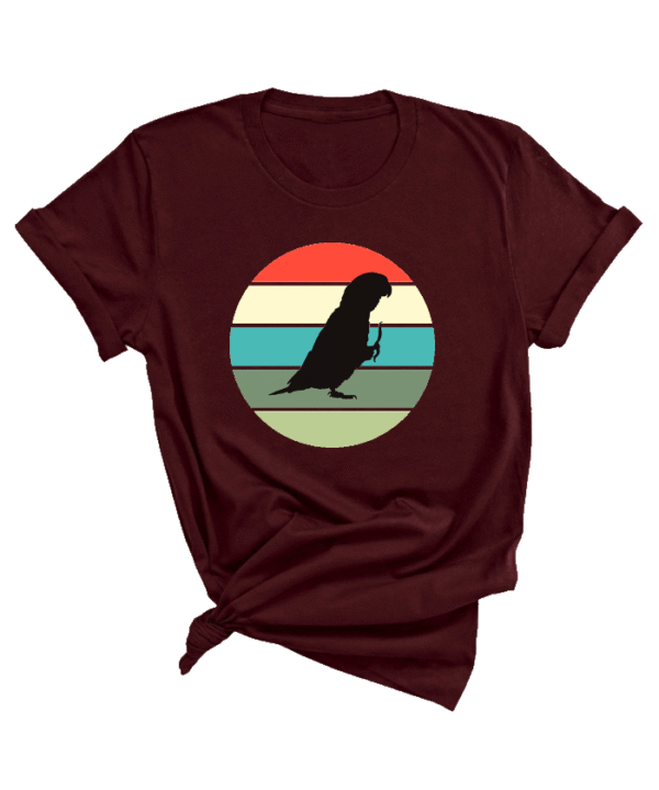 Shirt met silhouet van caique in retro zonsondergang design