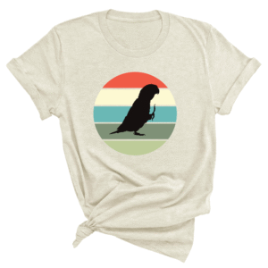 Shirt met silhouet van caique in retro zonsondergang design