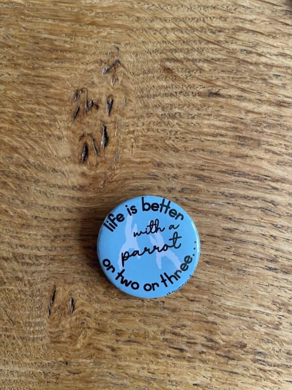 Life is better with a parrot or two or three.. button